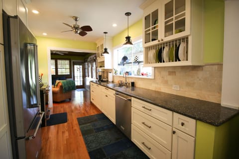 Our newly remodeled kitchen facing the back entertainment room.