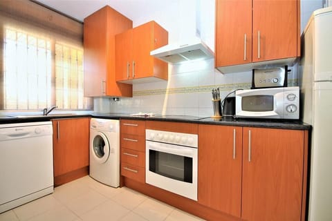 Fully equipped kitchen with all the appliances