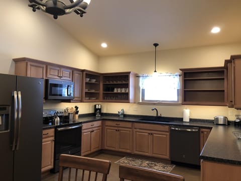 Fully Stocked Gourmet Kitchen.