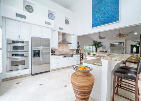 A fully equipped chef's kitchen can be enjoyed with every amenity provided. 