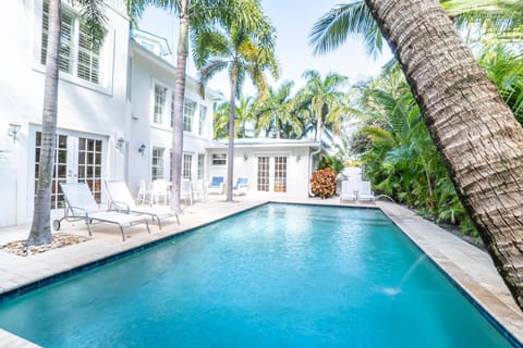 Swim in the heated salt-filter pool under the palm trees in the private garden.