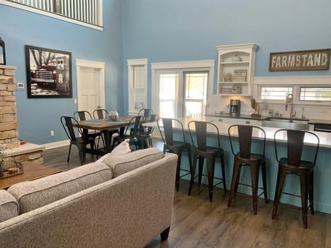view of kitchen island and kitchenette with sliding doors that lead to backyard