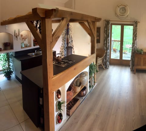 Spacious kitchen dining room with stunning veiws, leading to terrace and garden