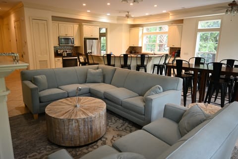 Comfortable living room seating in the open kitchen, living room, dining room.