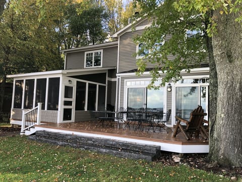 Large windows on lakeside to take in the breath-taking views! Large shade tree. 