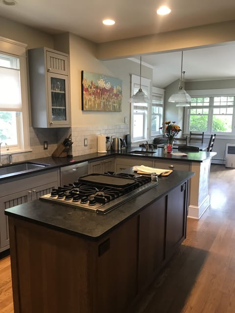 Kitchen with breakfast table in the background.