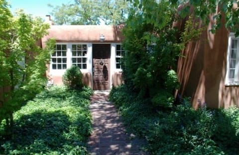 Solar-powered historic adobe. Organic & native xeric plantings. Art filled home.