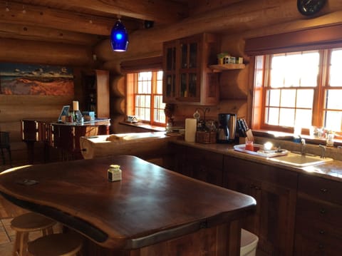 Walnut kitchen. Piano in dining room 