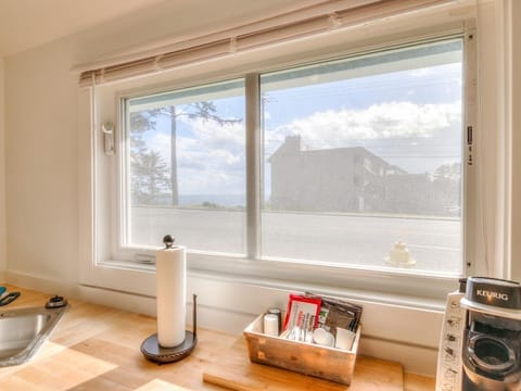 View from the Kitchen Window. Can see the Ocean across Hwy 101