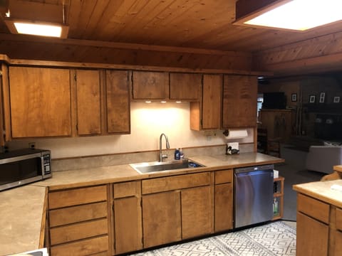 Large kitchen w/ dishwasher, large stainless sink and large french door fridge!