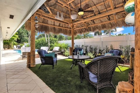 Large Tropical Tiki w/ Plush Furniture, Comfy Turf and Fan at the end of Pool