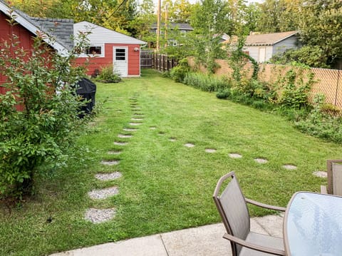 Fenced in back yard. Detached garage (one space included with rental).