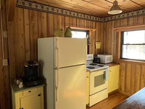 full size kitchen with keurig coffee maker
