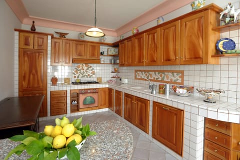 Main kitchen on same floor with dining and living area