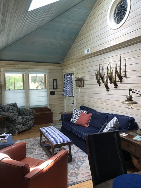 Comfortable Living Room with Vaulted Ceiling