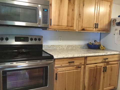 Coffee maker, microwave, stove/oven, mixer, blender, full size refrigerator, etc