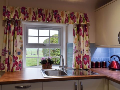 Kitchen with breakfast area | The Lodge Cottage, Methven, near Perth