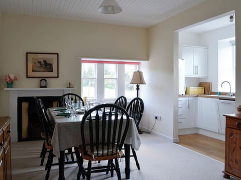 Dining room and adjacent kitchen | Dairy Cottage, Whitehouse, near Alford
