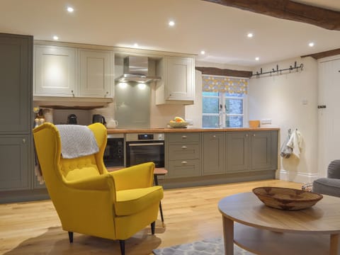 Sitting room and well appointed kitchen area | Stables End, Stickle Path, near Watchet