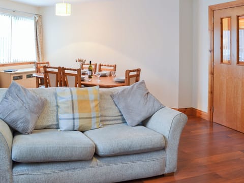 Comfortable living/dining room | Glen Apartment, Aviemore