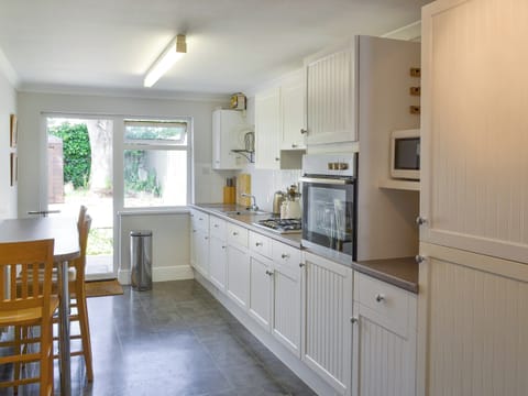 Well-appointed fitted kitchen with dining area | Number Five, St Minver, near Rock