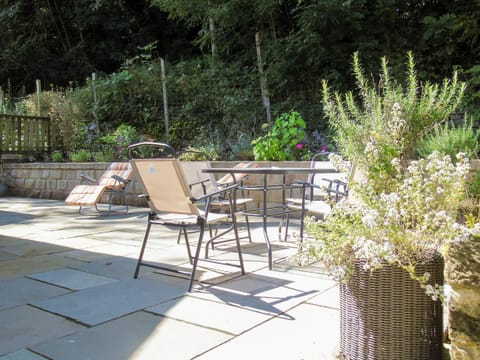 Enclosed patio with garden furniture and BBQ | Netherwood, Bakewell