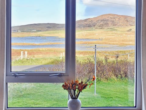 Wonderful loch views from the back bedroom | Padraig’s Cottage, Howbeg (Tobha Beag), Isle of South Uist