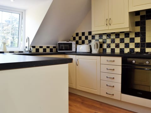 Lovely kitchen with breakfast bar | The Nest, York