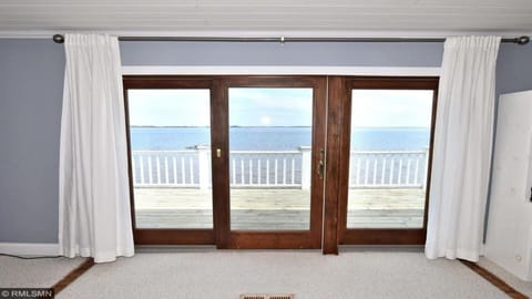 Master bedroom view with deck