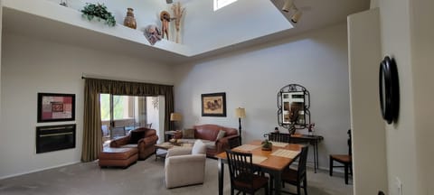 Living Room & Dining Room with vaulted ceiling
