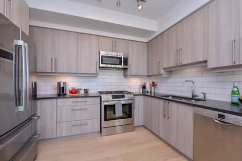 Soft close cabinets, granite countertops, quiet dishwasher, ample cupboard space...