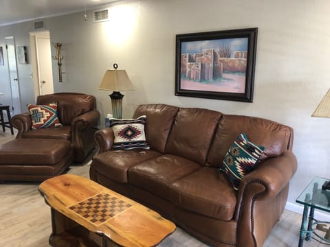 Living area when walking in.  AAA Leather furniture.