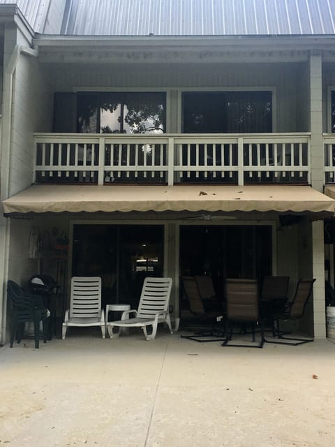 View of Upstairs Bedroom Doors and Terrace from Boat Dock