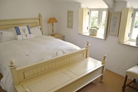 Ground floor: Large bedroom with super-king size bed and en suite shower room