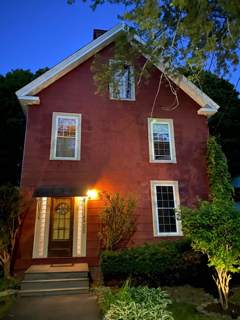 The Big Red House at twilight.