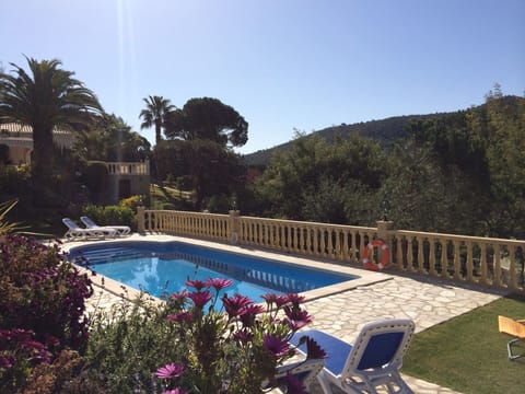 Large landscaped very sunny garden with lovely views, the sea is over the hill