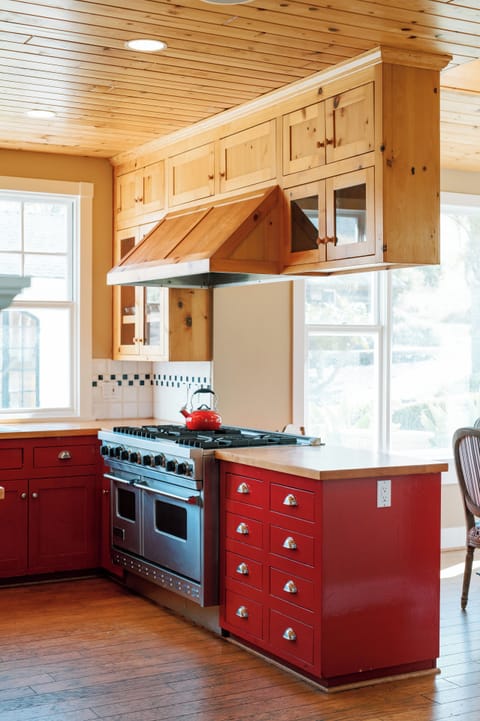 Main House Kitchen leads to Breakfast Nook with High Chair