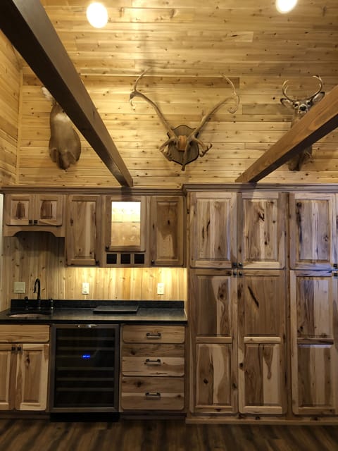 Wet bar with wine cooler - plenty of glassware for entertaining 