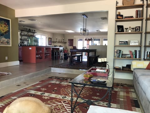 View from the TV den to the kitchen/dining area 