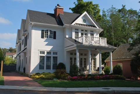 Designer's own unbelievable 9 BR, 10 BA lakefront residence only one block to the beach and boardwalk.  Front porch, balcony, living room and 2 master bedrooms all front Silver Lake.