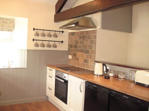 Fully equipped kitchen with oven, hob,microwave, fridge,freezer and dishwasher.