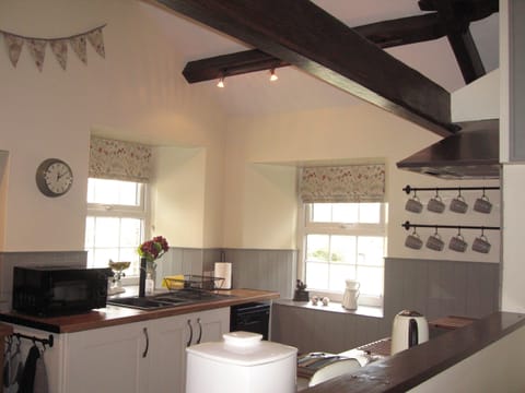 Beautiful first floor kitchen with views across the village.