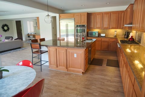 View from Breakfast Room of Kitchen, with glimpse of Great Room and Dining Room.