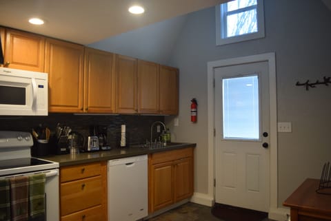Kitchen boasts double sink, new appliances and everything within easy reach.