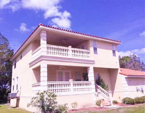 Side porches Now Both Screened - Rear entrance. House just across road from pool
