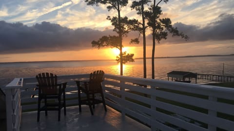 Sunrise from the crows nest upstairs off primary bedroom. The view is worth it!