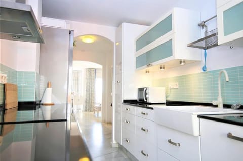 The fully equipped kitchen from another angle