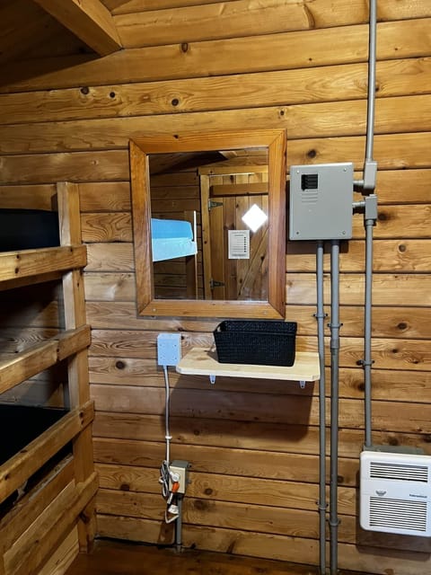 Shelving and extra outlets to charge all your devices.