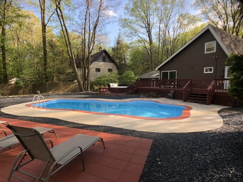 Private  Outdoor Pool w/ LED lighting and Lounging Chaises poolside