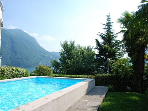 Swimming Pool, Property, Natural Landscape, Real Estate, House, Vacation, Tree, Estate, Grass, Building